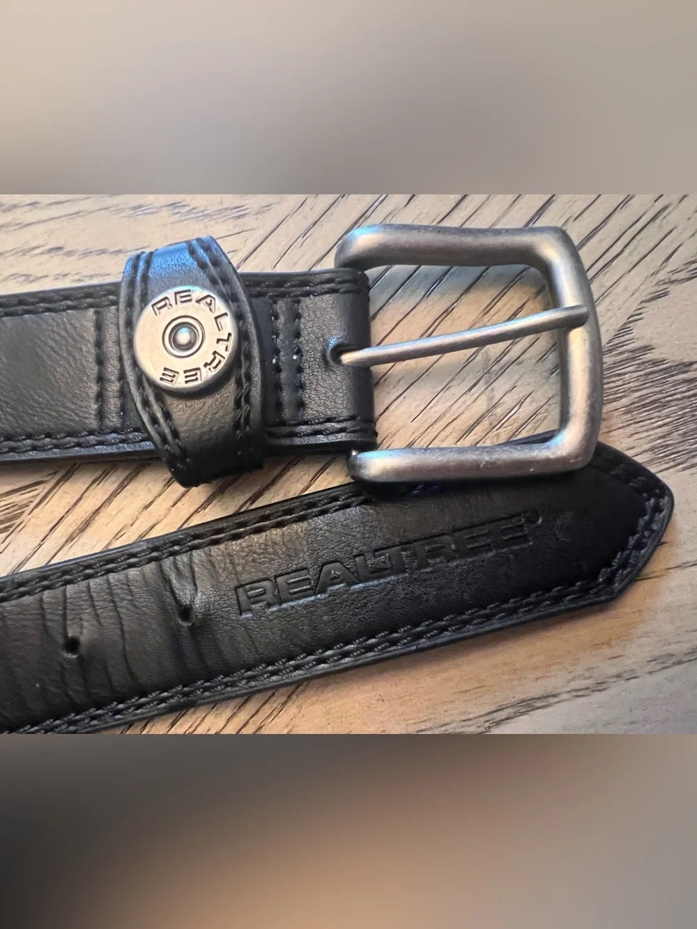 Realtree Men's Shotgun Shell Keeper Black Belt is a genuine leather Size 34-36